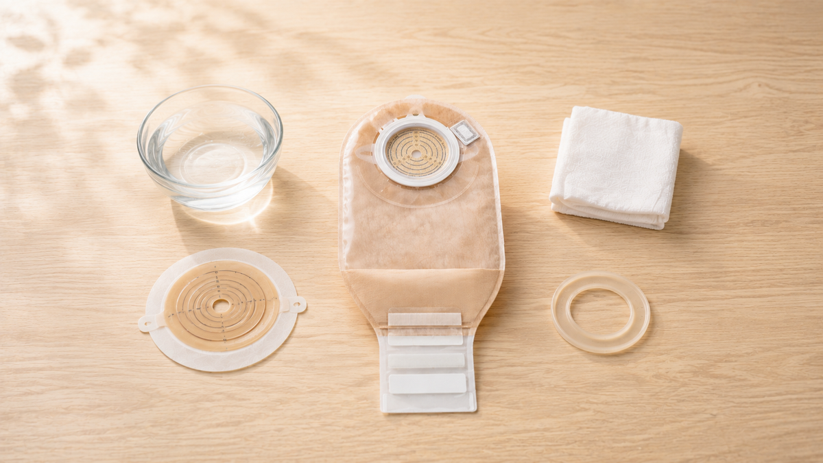 Person preparing clean ostomy pouching and skin care supplies at home.